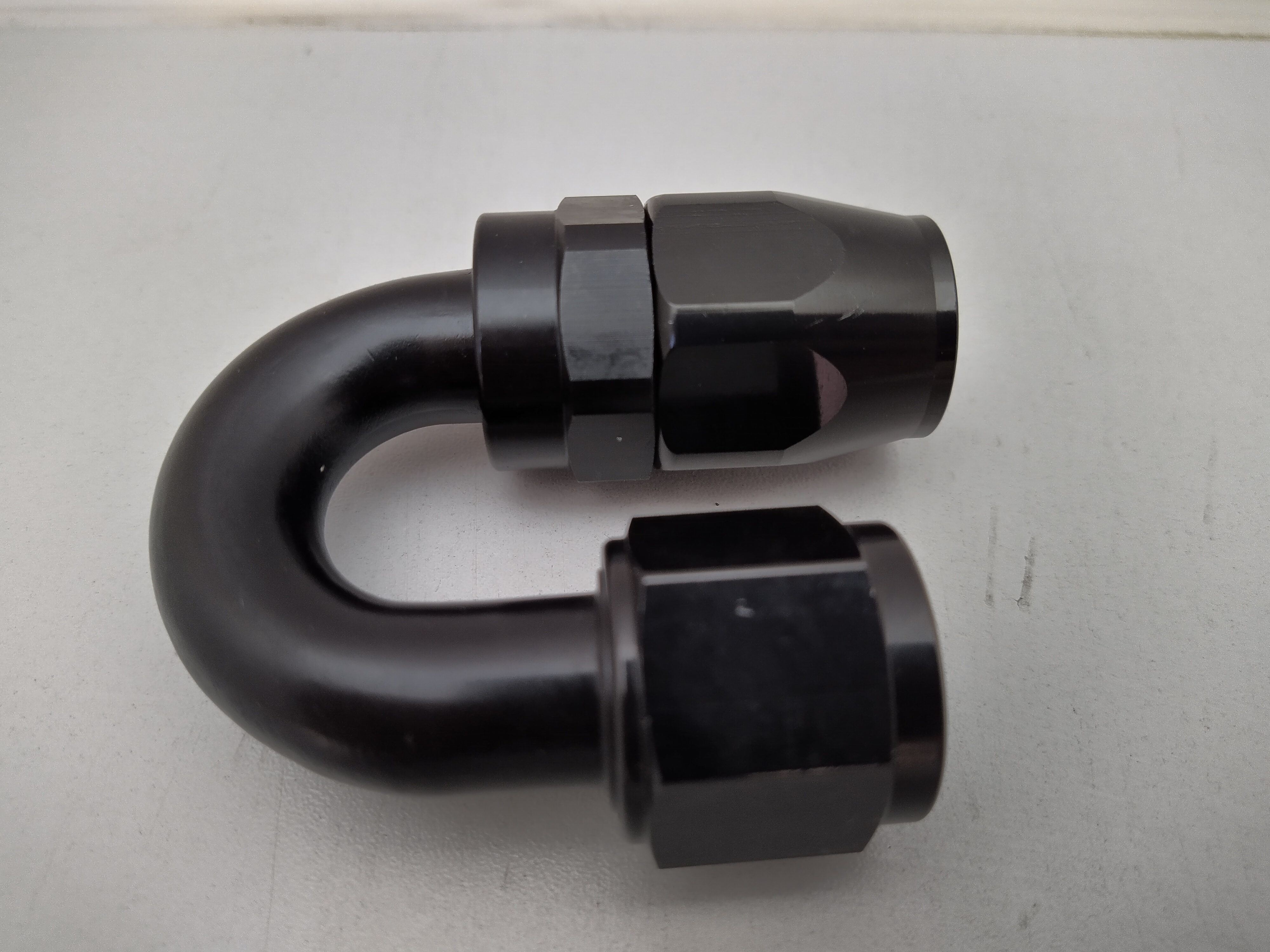Alu-Fitting schwarz AN10 Dash 10 180° Alu-Fitting schwarz AN10 Dash 10 180°
