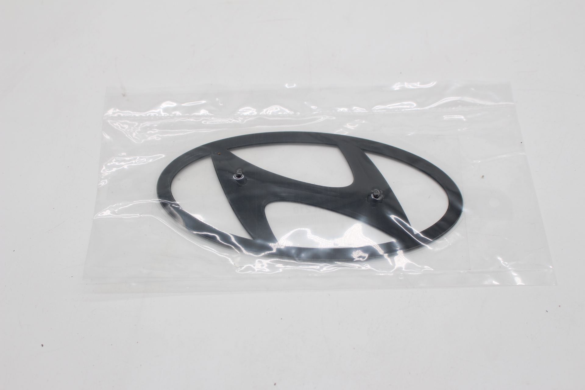 Hyundai IONIQ 6 Stoßstangen Emblem Schwarz 86305KL210 