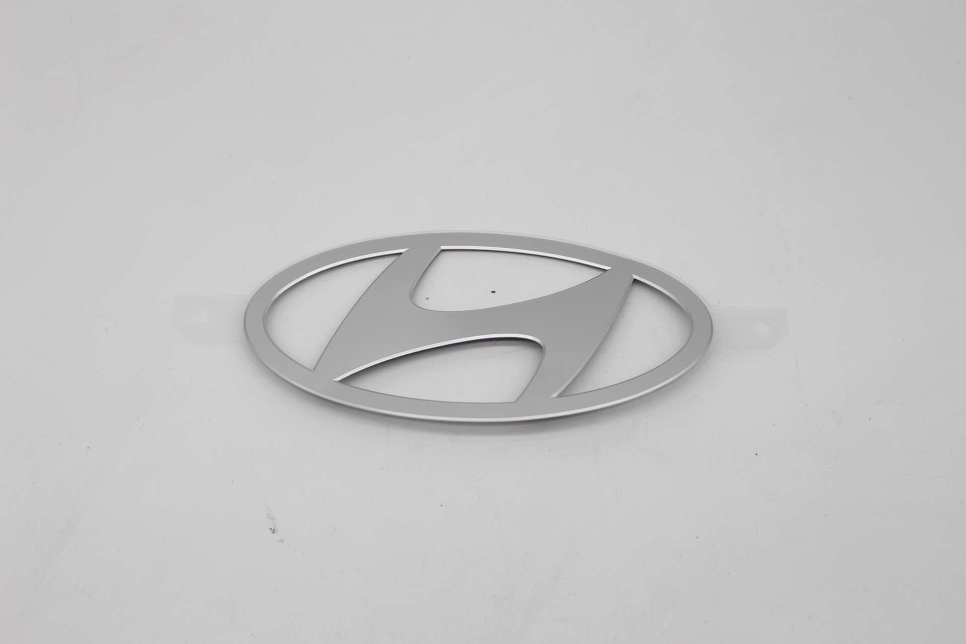 Hyundai IONIQ 6 Stoßstangen Emblem Silber 86305KL200